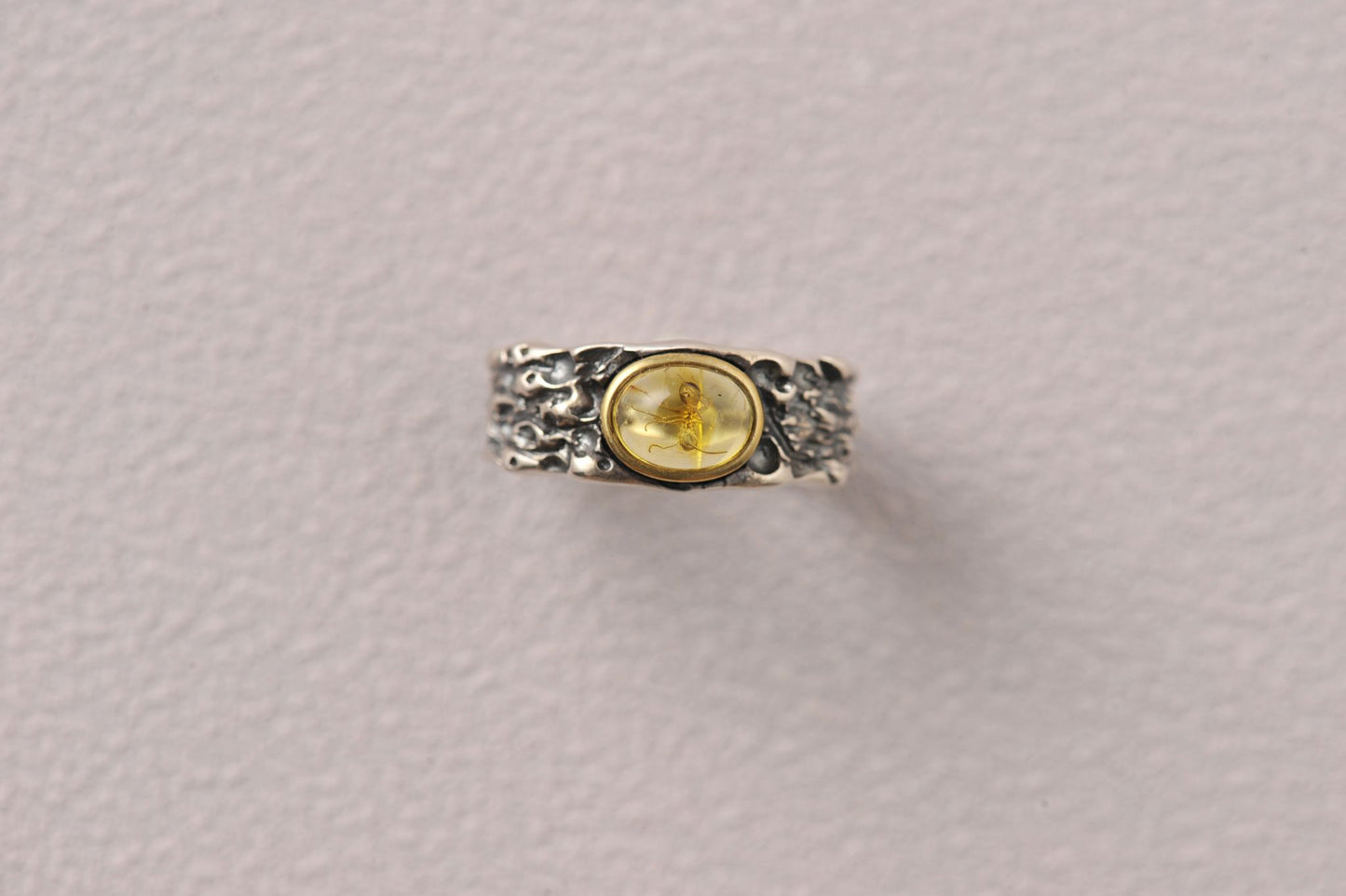 Insect Messenger in Time Loop Amber Ring