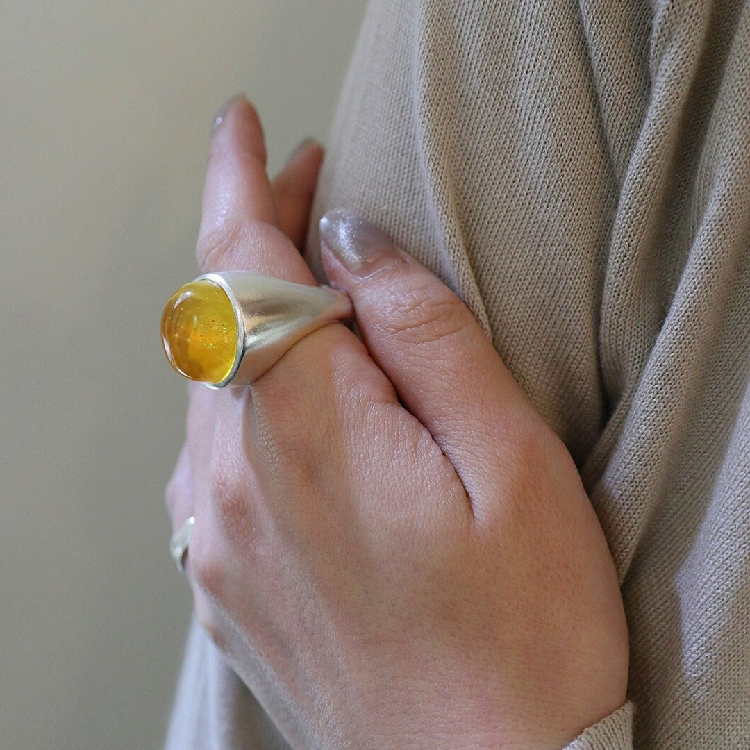 Wealth Sync Round Amber Pillar Ring